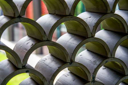 Traditional Chinese design with roof tiles and auspicious cloud patternsの写真素材