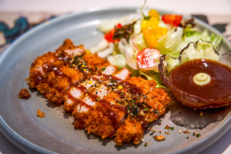 Crispy and delicious Japanese fried pork cutletの写真素材