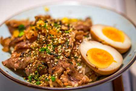 A bowl of delicious and fragrant Japanese-style grilled beef riceの写真素材