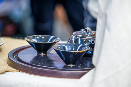 Close-up of a traditional Chinese glazed ceramic teacupの写真素材
