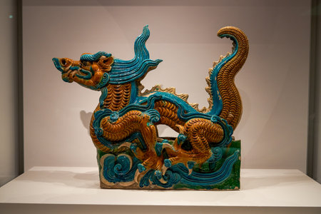 Painted dragon ceramic sculpture on display at the National Palace Museum, Hong Kongの写真素材