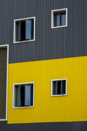 Colorful container iron faÃ§ade building blocks.