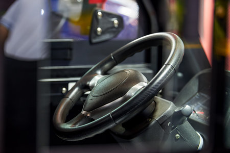 Image: Close-up of the steering wheel of a construction vehicle