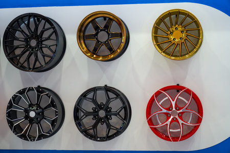 Picture: Close-up of car wheels in various colors and styles