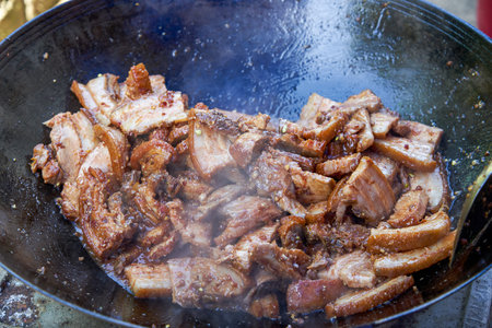 1. Braised traditional Chinese braised pork with rich sauce in a pot.