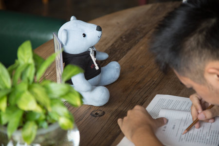 Boy studying bookの写真素材