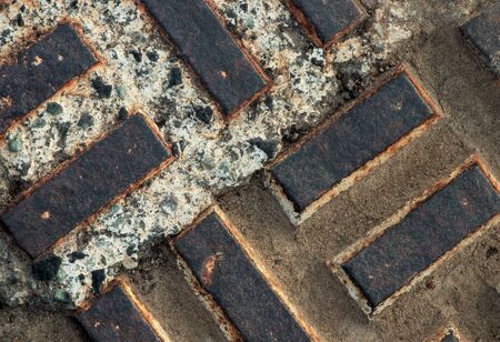 Metal sidewalk traction grate on concreteの写真素材