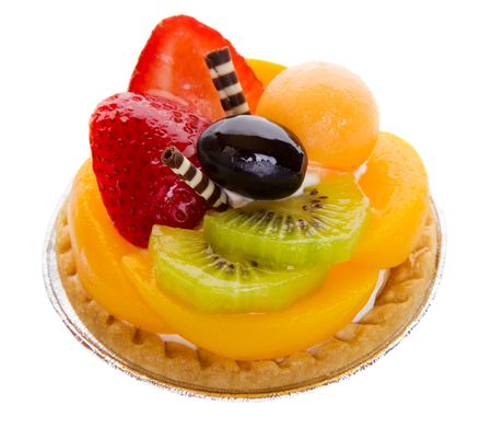 Closeup of a glazed fruit tart on a white backgroundの写真素材