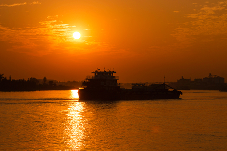 Boat under the sunsetの写真素材