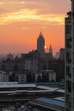 Guangzhou Panyu Bank of China Building in the sunsetのeditorial素材