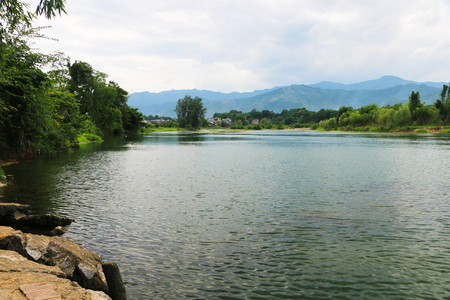 a quiet river flowing in the summerの写真素材