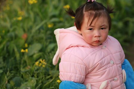 Sad little girl cryingの写真素材