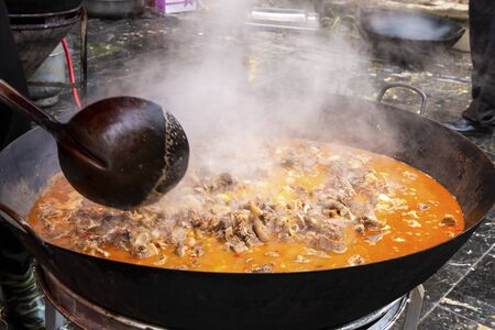 Chicken in the wokの写真素材