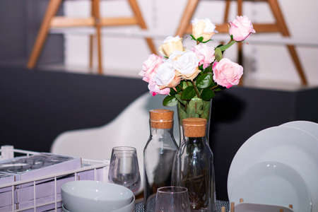Vase and cutlery on the table