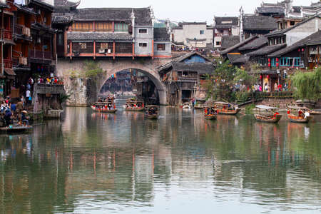 Stone arch bridge in the riverのeditorial素材