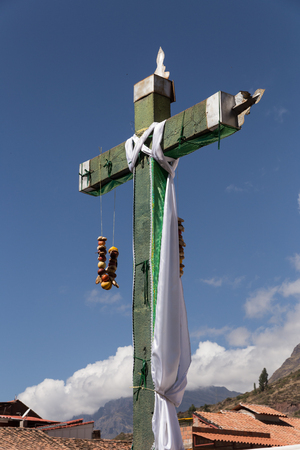 Cross agains vibrant skyの写真素材