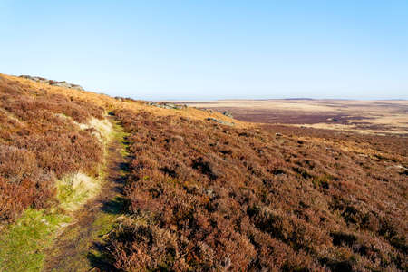 Narrow footpath follows the line of Stanage Edge on tis way across the moors