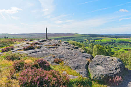 The Birchen Edge monument to Nelson and Trafalgar silhouetted against a bright summer morning skyの写真素材