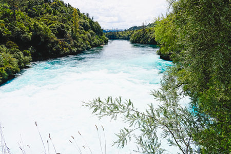 After flowing quickly through Huka Falls canyon the Waikato River continues its journey to Lake Taupo.の写真素材