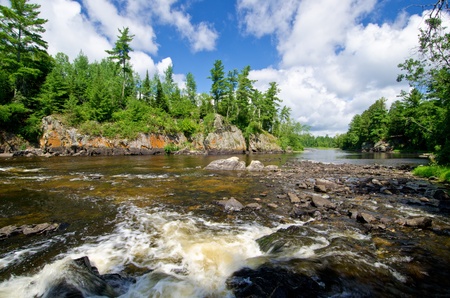 pipestone falls, cascades down into basswood lake, in the (bwcaw) boundary waters canoe area...