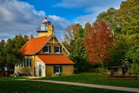 the historic eagle bluff lighthouse in peninsula state park, has been automated since 1926, is now a tourist destination, door county, wisconsin.の写真素材
