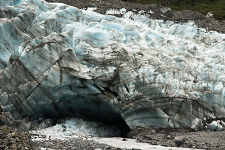Franz Joseph Glacier terminal ice wall and riverの写真素材