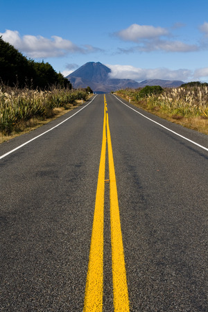 Long straight road to mt doom mountain, new zealandの写真素材