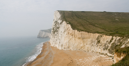 White Coast Cliffs in Lulworth Cove, Dorset, South Englandの写真素材