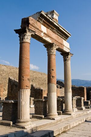 Ancient Pillar Arches in Pompeii Ruins, Italyの写真素材