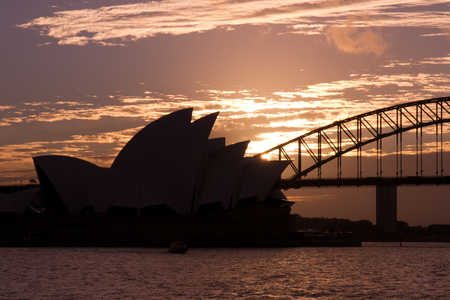 Dark Sydney Opera House and Sydney Harbour Bridge silhouette Sunset portraitのeditorial素材