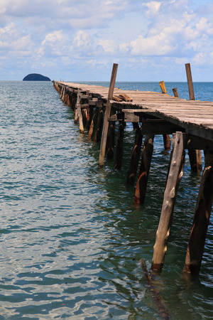 Ocean Pier with Cloudy Skyの写真素材