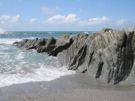 Rocks jutting into seaの写真素材