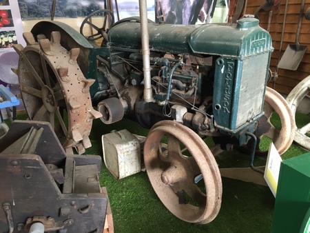 Old green tractor partially disassembledの写真素材