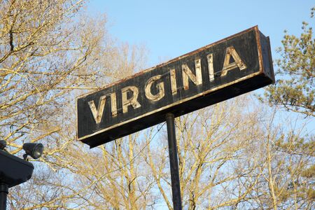An old neon Virginia sign from an abandoned gas station by the same name, located on the North Carolina and Virginia border.の写真素材