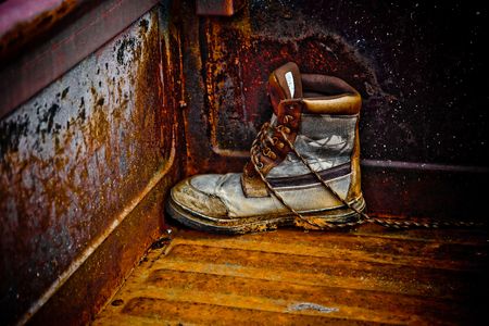 This boot seems to speak about this time of economic loss. Left alone, worked hard and cast aside.の写真素材