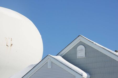 Water Tower Behind the Roofの写真素材