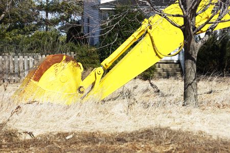 Yellow Crane Scoop Waiting for Springの写真素材