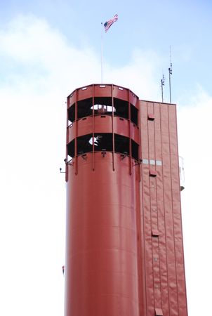 Red Lookout Tower with American Flagの写真素材