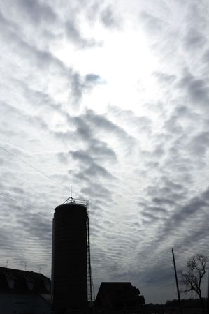 Storm Approaching Behind Siloの写真素材