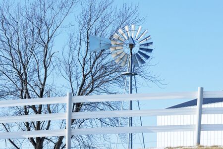 Silver Windmill and Blue Sky