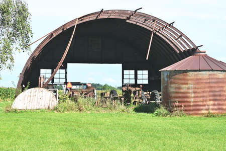 Grain Bin and Open Quonsetの写真素材
