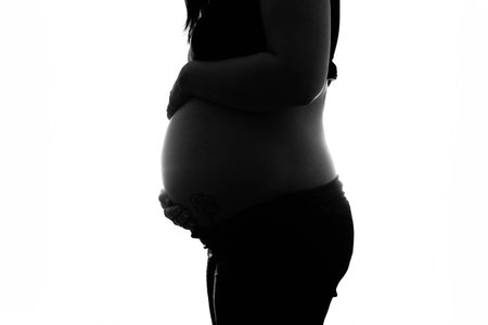 baby bump silhouette high keyの写真素材