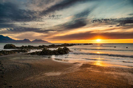 Sunrise at Kaikoura beachの写真素材