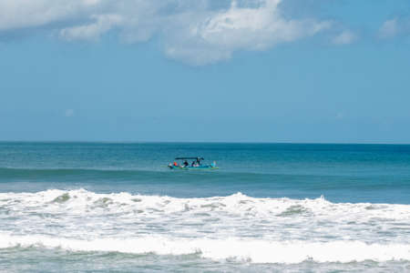 the massive carded Hindu gates marking the entrance from the town to the beach at Kuta Baliの写真素材