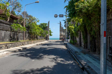 the massive carded Hindu gates marking the entrance from the town to the beach at Kuta Baliの写真素材