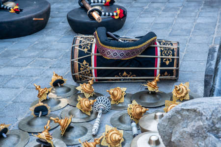 Traditional Hindu musical instruments lying unused on the ground at the religious ceremonyの写真素材