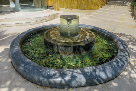 Round layered water fountain featureの写真素材