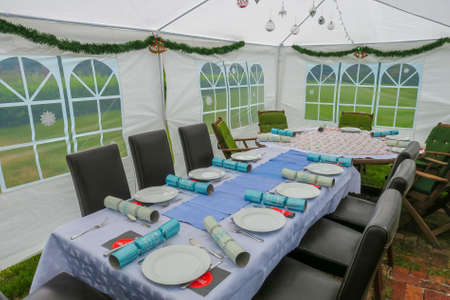 Christmas Family lunch in a Gazebo on the lawn in the gardenの写真素材