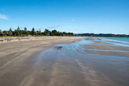 Tolaga Bay beach  and coastline at low tide taken from the historic wharfの写真素材