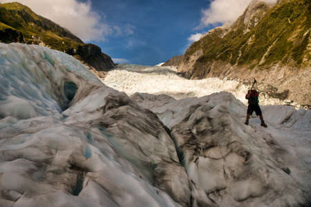 Following our hiking guide up the stunning Fox Glacier in New Zealands Southern Alpsの写真素材